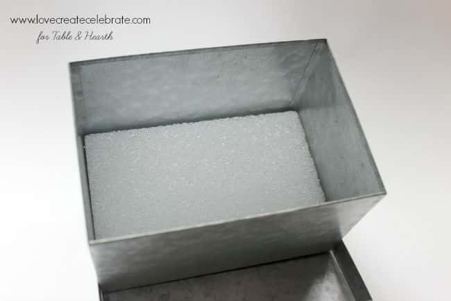 How cute!!!! Just a few simple items turn this little galvanized box into a rustic and industrial succulent planter!